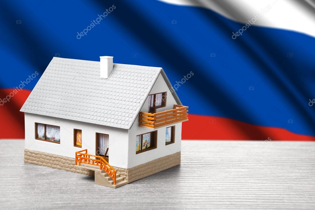classic house against Russian flag background