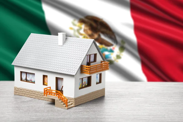 Classic house against Mexican flag background — Stock Photo, Image
