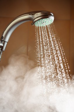 shower with flowing water and steam clipart