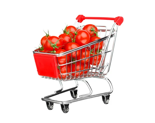 Conceito de compras saudável - carrinho de compras com tomates, isolado em branco — Fotografia de Stock