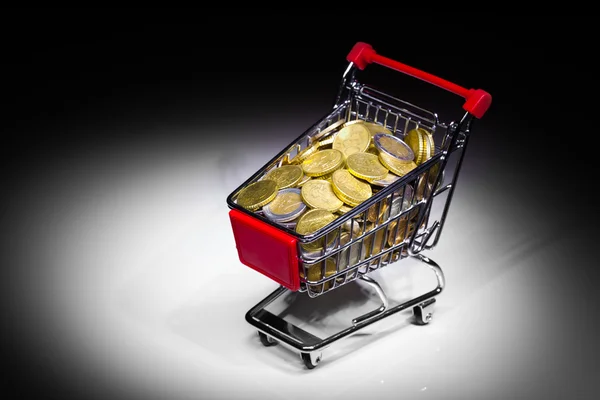 Shopping cart full of money — Stock Photo, Image