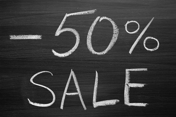 50-percent sale title written with a chalk on the blackboard — Stock Photo, Image