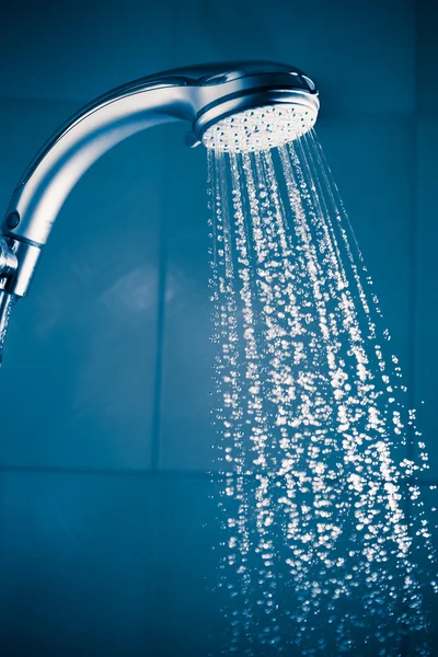 Refreshing shower with water stream — Stockfoto