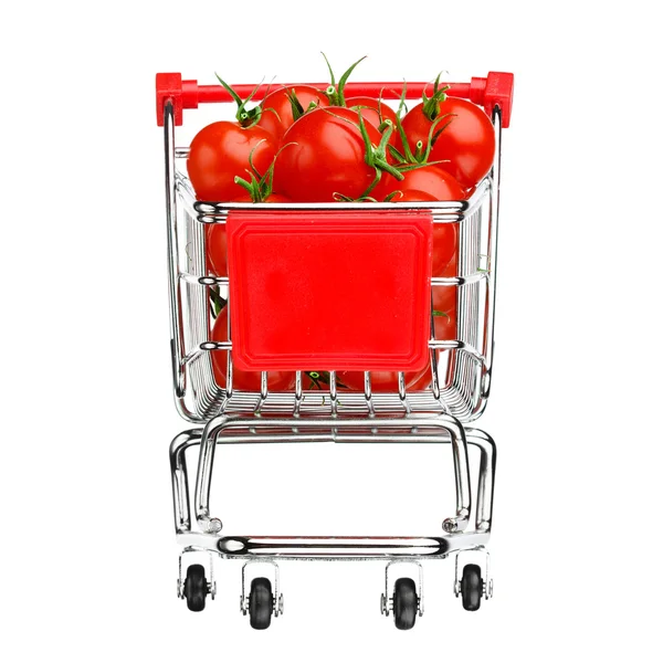 Conceito de compras saudável - carrinho de compras com tomates, isolado em branco — Fotografia de Stock