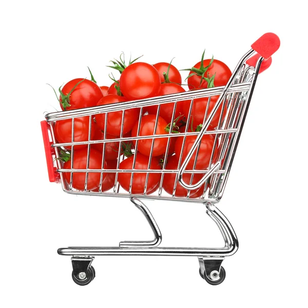 Conceito de compras saudável - carrinho de compras com tomates, isolado em branco — Fotografia de Stock