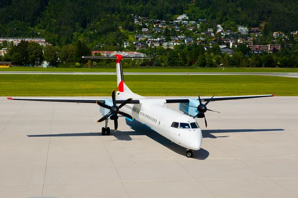 Airplane in the airport — Stock Photo, Image