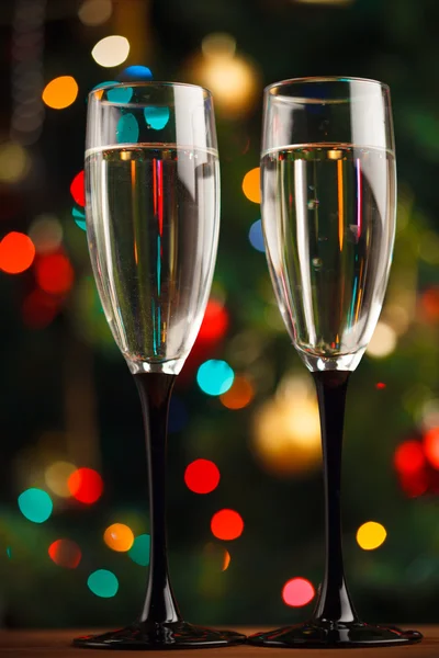 Pair of champagne glasses on the threshold of new year — Stock Photo, Image