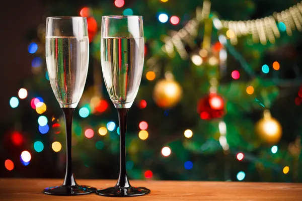 Pair of champagne glasses on the threshold of new year — Stock Photo, Image