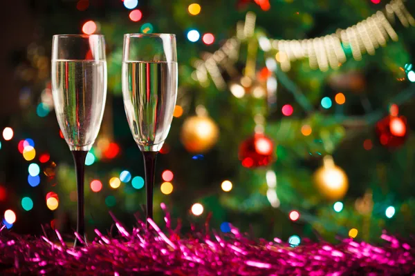 Pair of champagne glasses on the threshold of new year — Stock Photo, Image