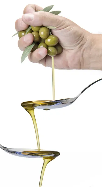 Handful of olives dropping — Stock Photo, Image