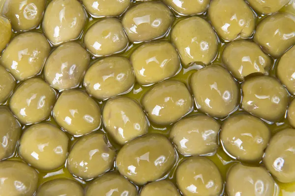 Pitted olives covered in oil — Stock Photo, Image