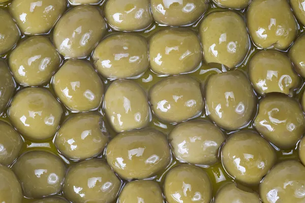Pitted olives covered in oil — Stock Photo, Image