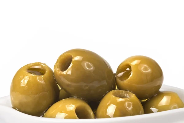 Urkärnade oliver på en vit bakgrund — Stockfoto