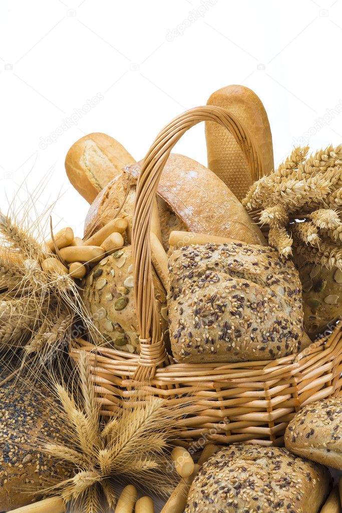 Basket with a bread assortment isolated on white