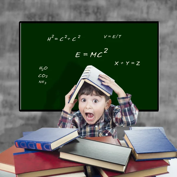 Child with a surprised expression at the classroom — Stock Photo, Image