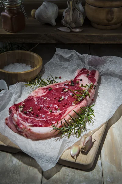 Steak on the table of the kitchen — Stock Photo, Image