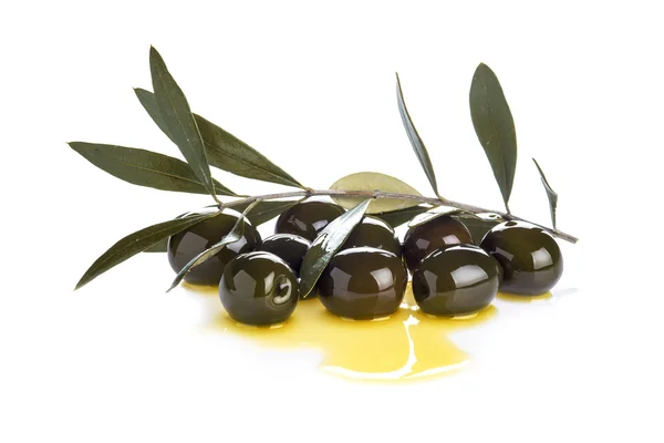 Olives covered in oil isolated on white — Stock Photo, Image