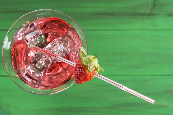 Red martini cocktail with strawberry — Stock Photo, Image