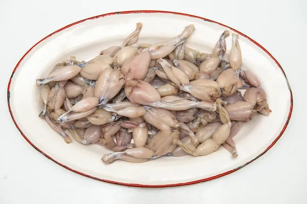 Fresh and raw frog legs ready to be cooked — Stock Photo, Image