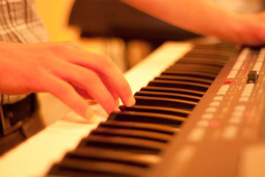 Piano player closeup on hands