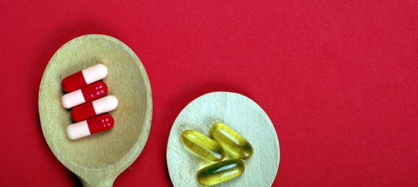 Health concept,medicine on wooden spoon — Stock Photo, Image