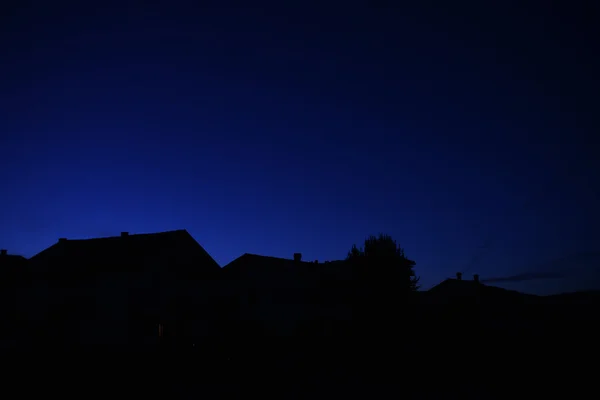 Deep blue urban sunset — Stock Photo, Image