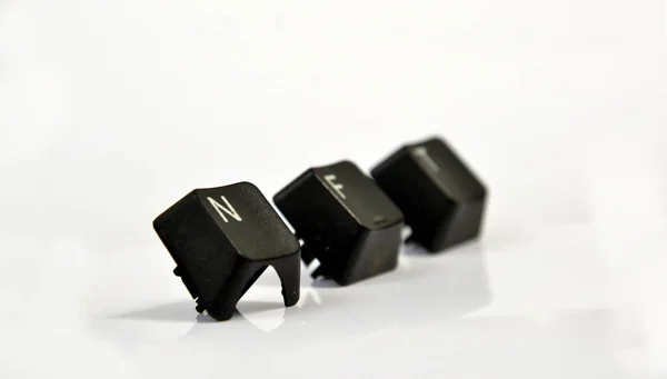 NFT text with used black computer keys on white — Stock Photo, Image