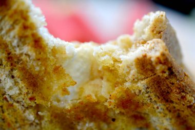 Kavrulmuş ekmek arkaplan dokusunu kapat. Makro fotoğraf