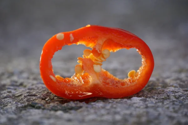 Cut Slices Sweet Pepper Cement Background — Stock Photo, Image