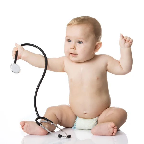 Adorable Baby Boy with stethoscope on white background Royalty Free Stock Images