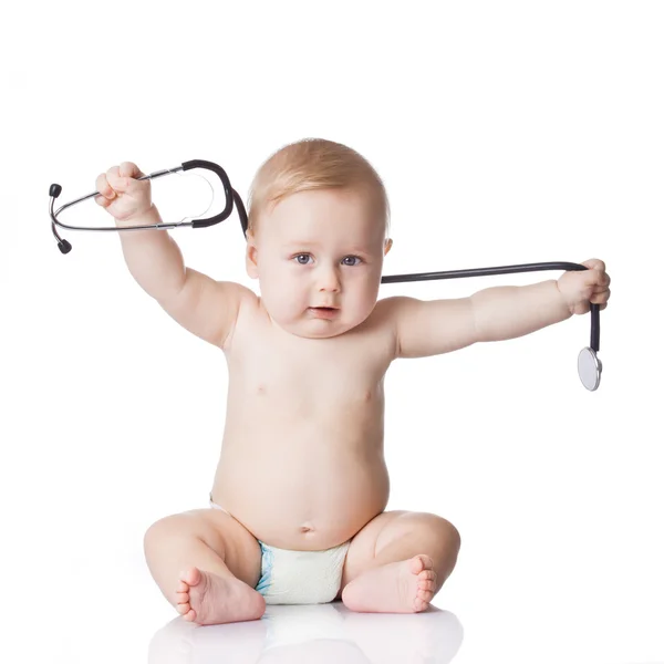 Bébé doux avec stéthoscope sur fond blanc. Adorable bébé — Photo