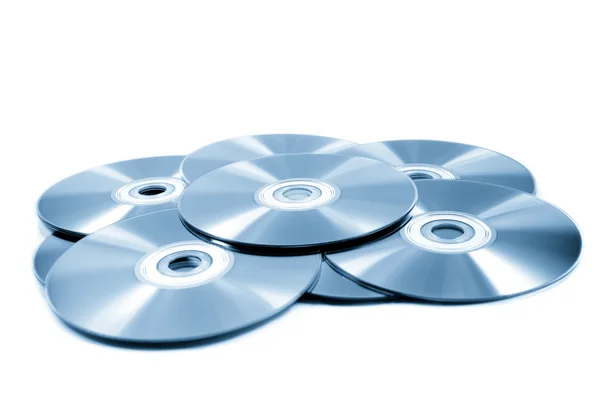 Stack med cd-rom. CD & DVD-skiva på vit bakgrund — Stockfoto