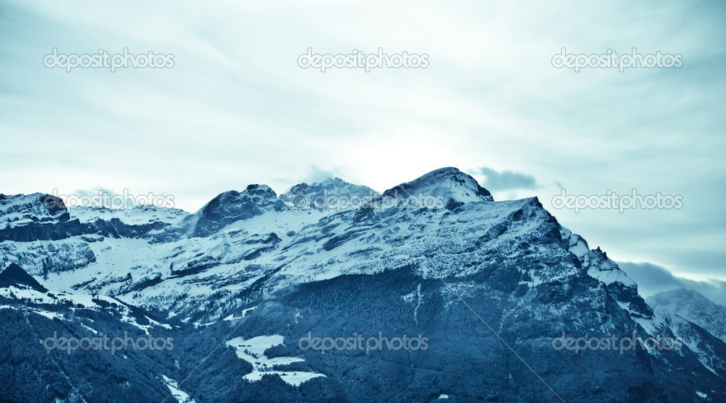 Landscape of the mountains covered with snow. Snowy Mountain.