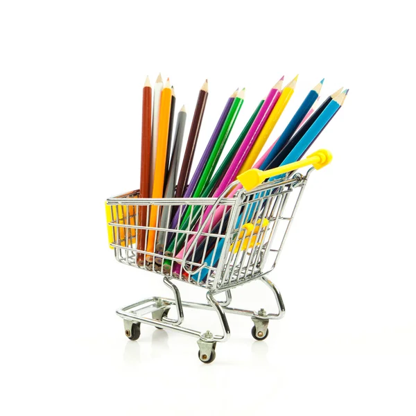 Color pencils in shopping cart. — Stock Photo, Image