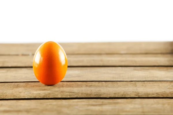 Colorful easter eggs on old wooden background. Easter concept. — Stock Photo, Image