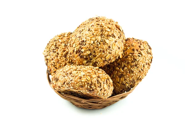 Round wholemeal bread. resh buns with different seeds. — Stock Photo, Image