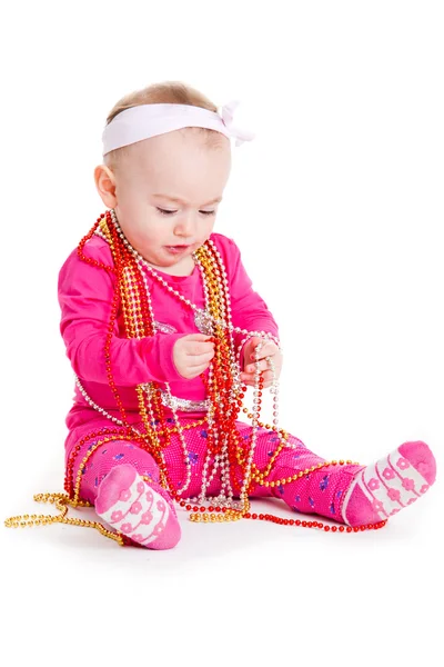 Niña jugando con cuentas. Hermosa niña. Bebé feliz —  Fotos de Stock