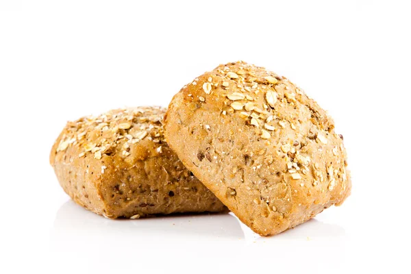 Bröd på en vit bakgrund. läckra bullar isolerad på vit — Stockfoto