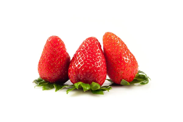 Strawberries with leaves. Isolated on a white background. — Stock Photo, Image