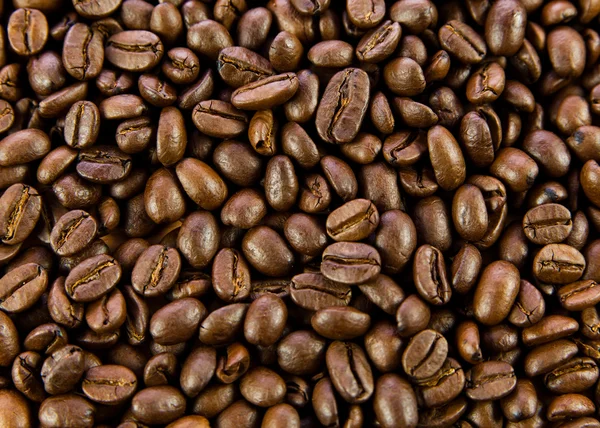 Brunt kaffe, bakgrundsstruktur. rostade kaffebönor. brun co — Stockfoto