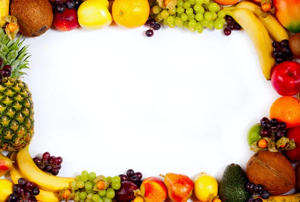 Confine o cornice di frutti colorati. Assortimento di frutti esotici, isolati su sfondo bianco . — Foto Stock