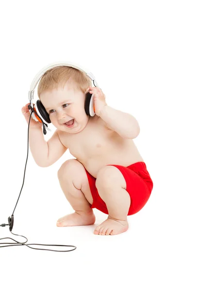 Baby with headphone. young DJ Stock Image
