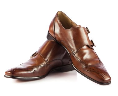 Brown man's shoes isolated on white background. Pair of brown m