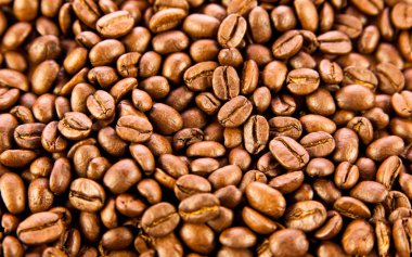 arka plan doku kahverengi bir kahve. kavrulmuş kahve çekirdeği. kahverengi co