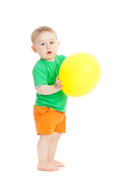 Babyjongen met gele ballon — Stockfoto