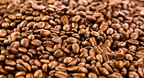 Brunt kaffe, bakgrundsstruktur. rostade kaffebönor — Stockfoto