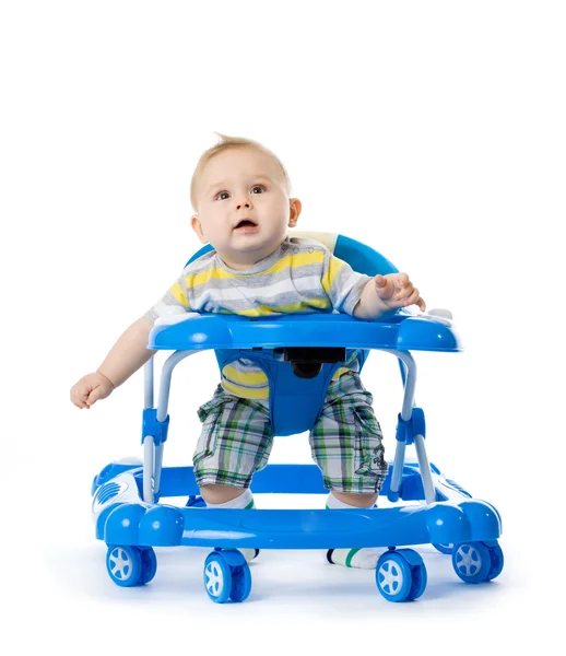 Little baby in the baby walker. — Stock Photo, Image