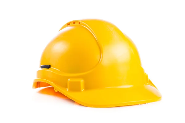 Casco di sicurezza giallo su sfondo bianco. cappello rigido isolato su — Foto Stock