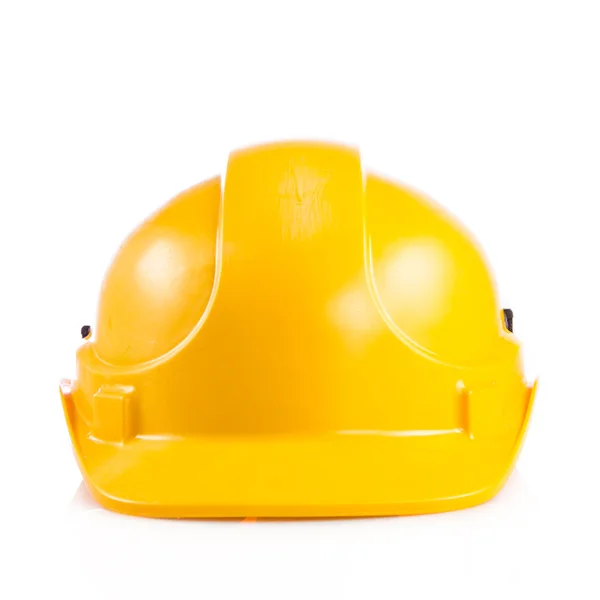 Capacete de segurança amarelo no fundo branco. chapéu duro isolado em — Fotografia de Stock