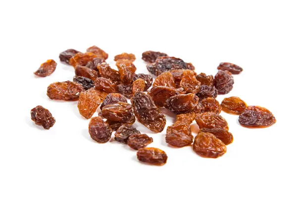 Brown raisins on a white background — Stock Photo, Image